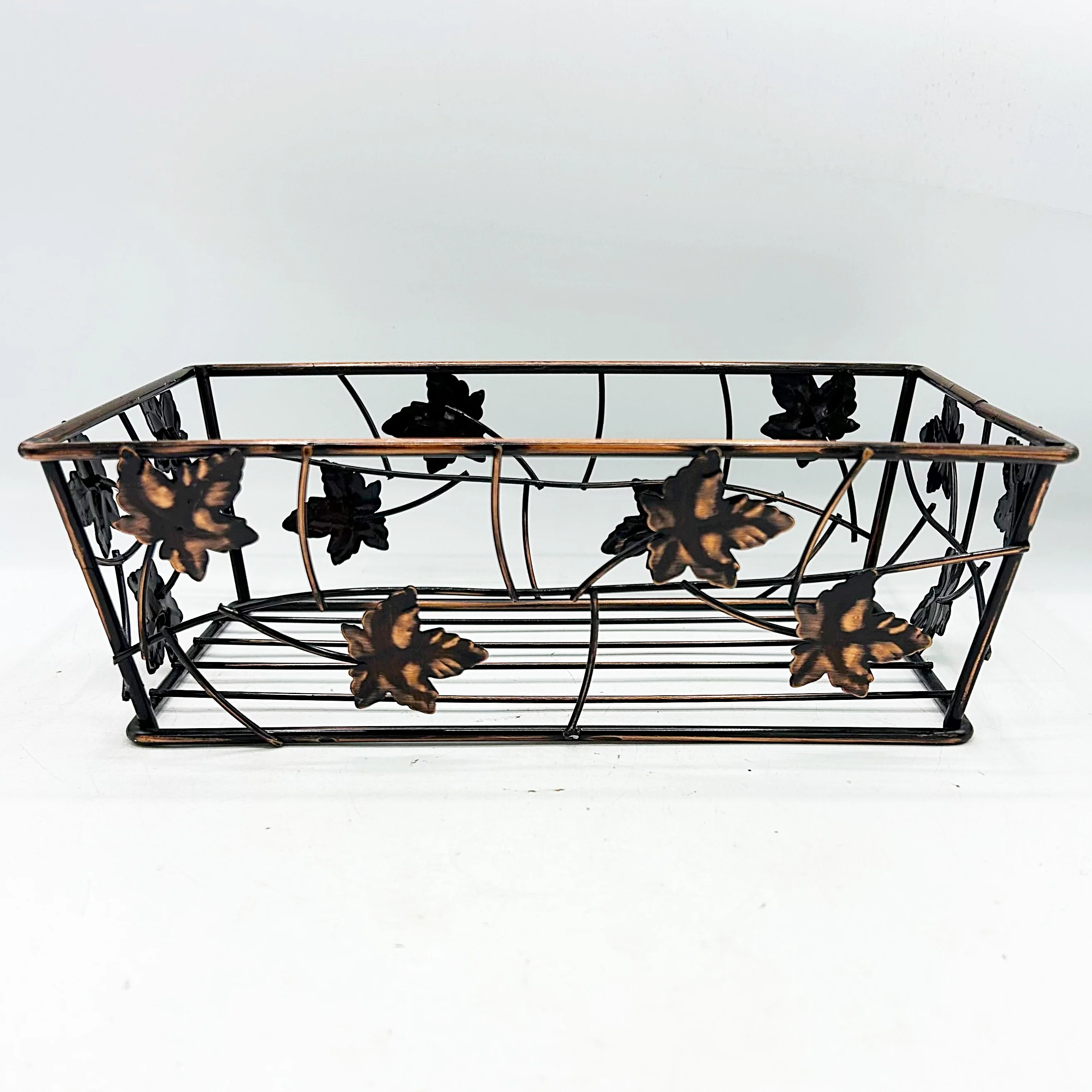 Copper-Toned Metal Basket with Leaf Accents