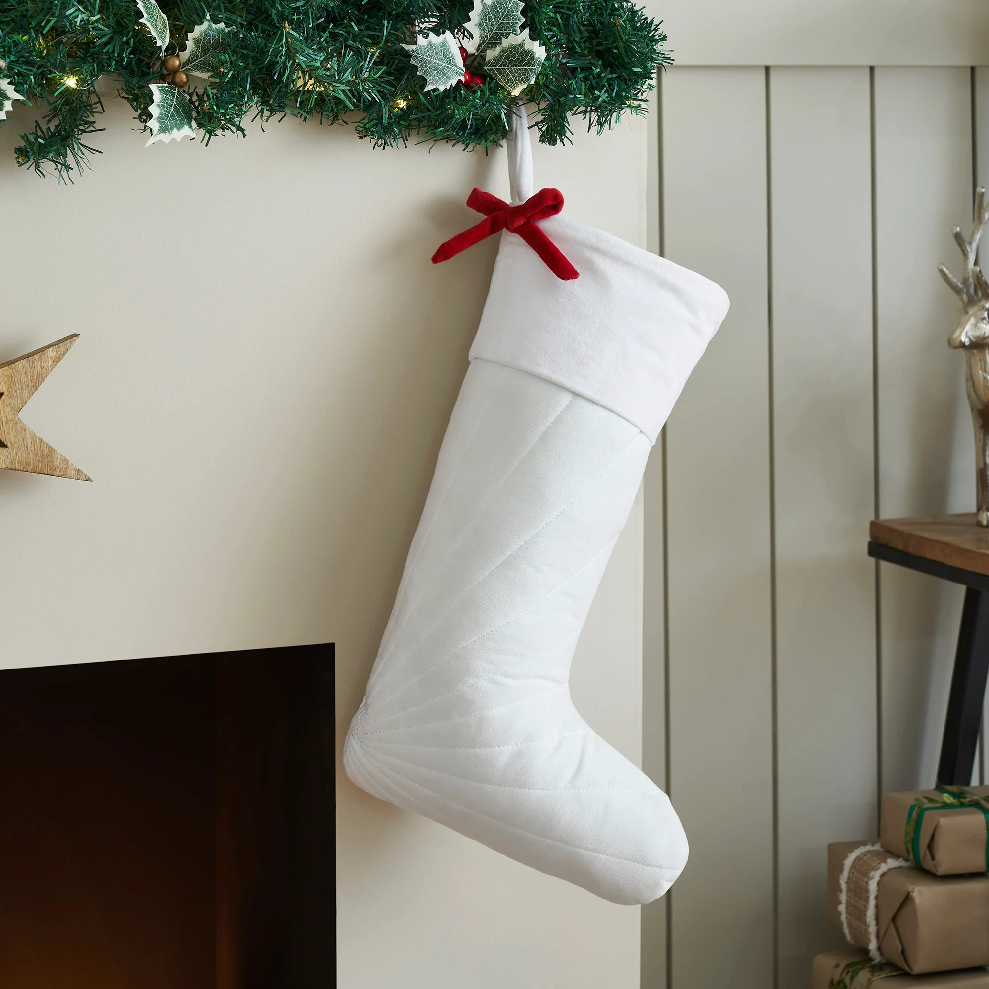 Quilted White Velvet Stocking with Red Bow